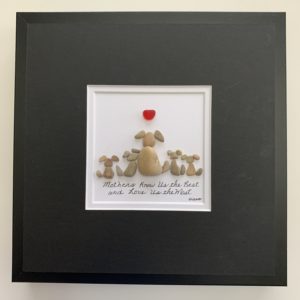family of five dogs pebble art